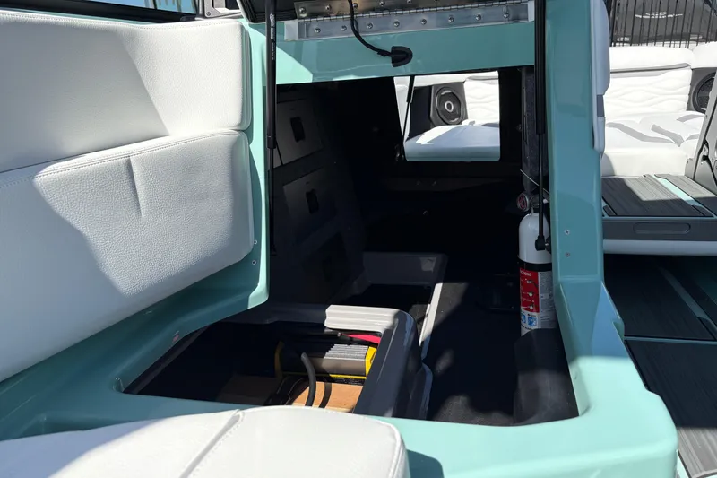 Slide: The Image of Interior view of 2026 Supra SA 550 boat, featuring seating and storage compartments. - 30