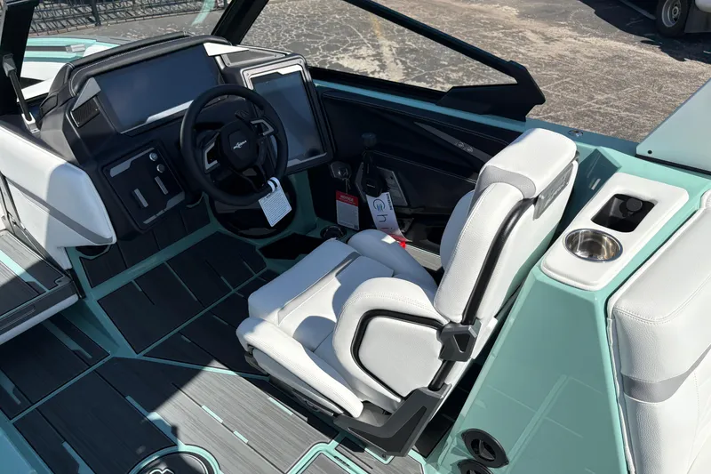 Slide: The Image of 2026 Supra SA 550 boat interior with modern dashboard and white seating. - 31