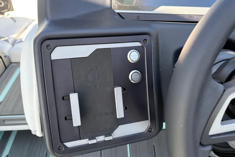 Slide: The Image of 2026 Supra SA 550 dashboard with Qi wireless charging and control buttons. - 35