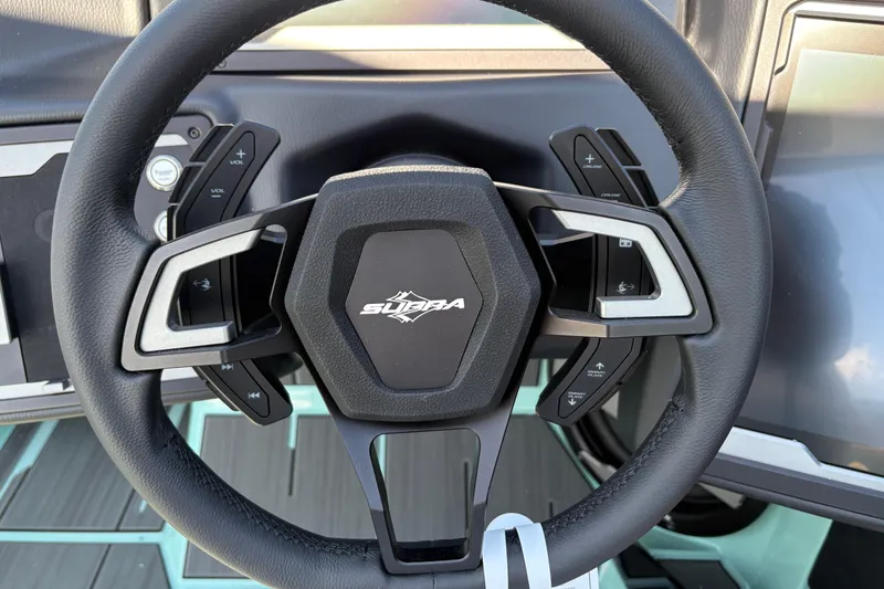 Slide: The Image of Steering wheel of 2026 Supra SA 550 with integrated controls and modern design. - 36