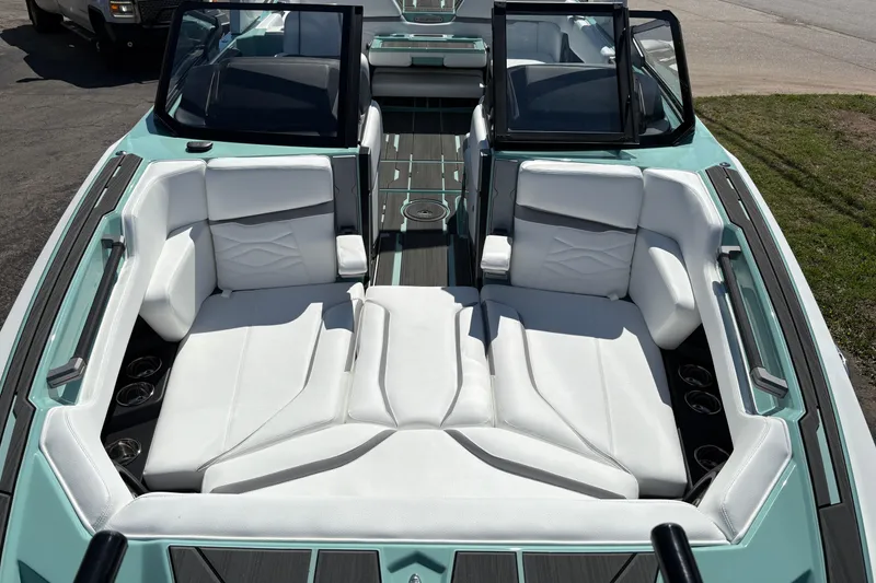 Slide: The Image of 2026 Supra SA 550 boat interior with white seating and modern design. - 41