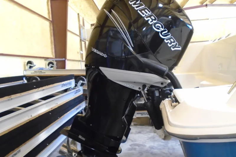 Slide: The Image of Boston Whaler 330 Outrage 2011 with Mercury Verado engine in storage. - 25