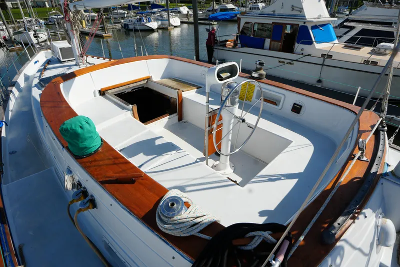 Slide: The Image of Cockpit of 1990 Endeavour 43 Center Cockpit sailboat docked at marina. - 6