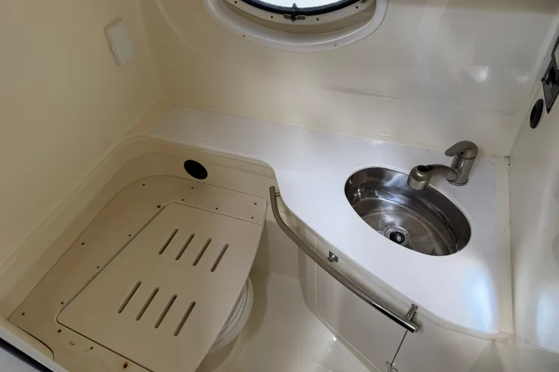Slide: The Image of 2017 Monterey 355 Sport Yacht bathroom with sink and compact design. - 27