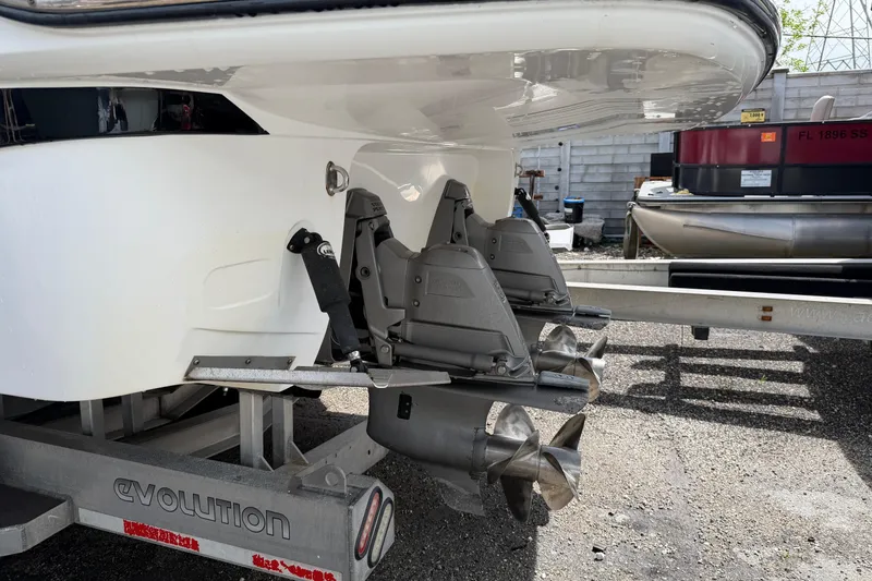 Slide: The Image of 2017 Monterey 355 Sport Yacht on trailer, showcasing dual propellers and stern drive. - 30