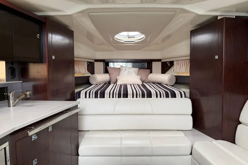 Slide: The Image of Luxurious interior of 2017 Monterey 355 Sport Yacht with elegant bedding and modern furnishings. - 35