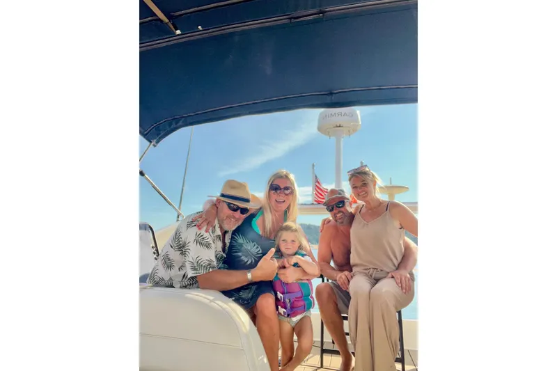 Slide: The Image of Family enjoying a sunny day on a 1999 Maxum 4100 SCB yacht. - 47
