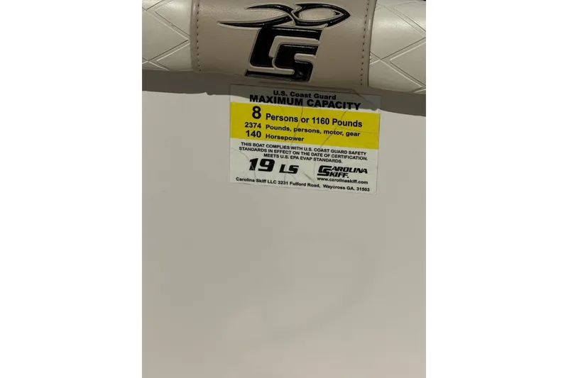 Slide: The Image of 2023 Carolina Skiff 19 LS capacity label, 8 persons, 1160 pounds, 140 horsepower. - 18