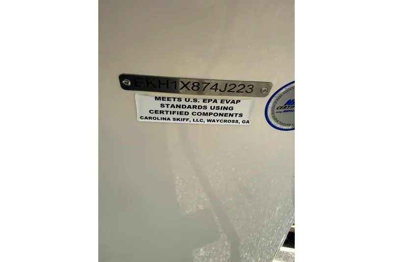 Slide: The Image of 2023 Carolina Skiff 19 LS compliance label, meets U.S. EPA standards, Waycross, GA. - 8