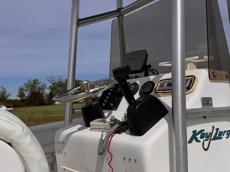 Slide: The Image of Steering console of a 2005 Key Largo 20 boat with Garmin device. - 3