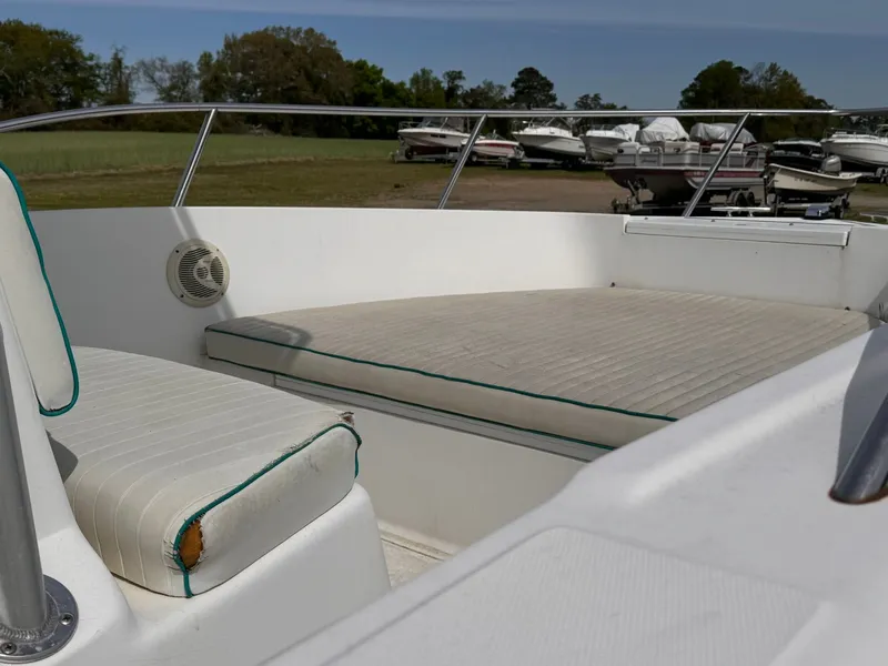Slide: The Image of Interior view of a 2005 Key Largo 20 boat with seating area. - 4