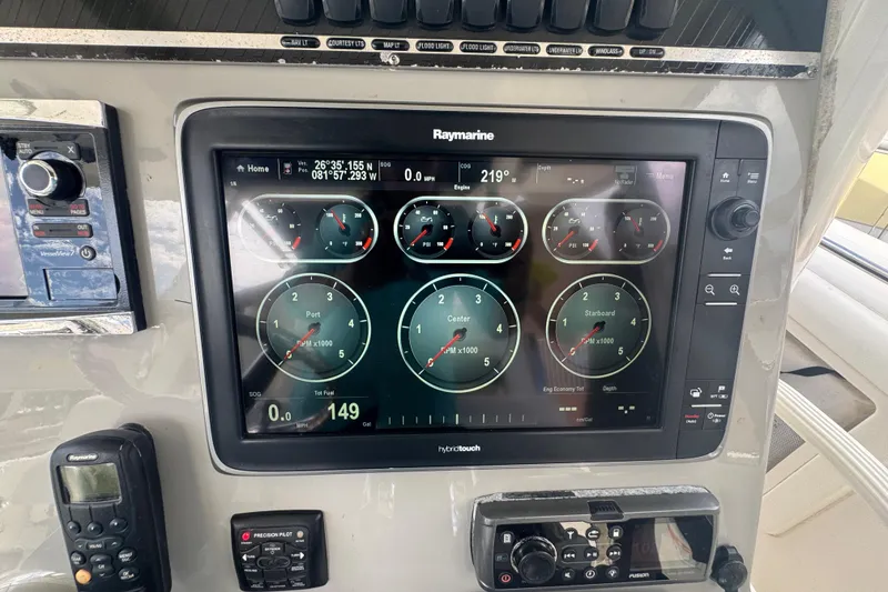 Slide: The Image of Control panel of a 2014 Boston Whaler 350 Outrage with Raymarine display. - 15