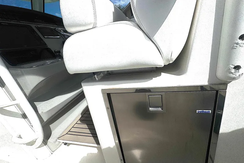 Slide: The Image of Interior of 2014 Boston Whaler 350 Outrage boat with Port side fridge and Freezer  #1 - 36