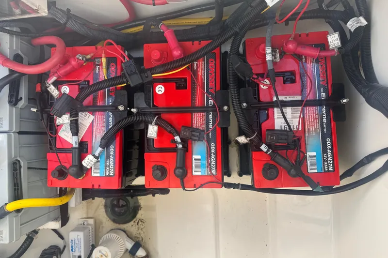 Slide: The Image of Three Odyssey marine batteries in a 2014 Boston Whaler 350 Outrage boat. - 55