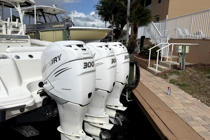 Slide: The Image of Three Mercury Verado 300 engines on a 2014 Boston Whaler 350 Outrage boat. - 60