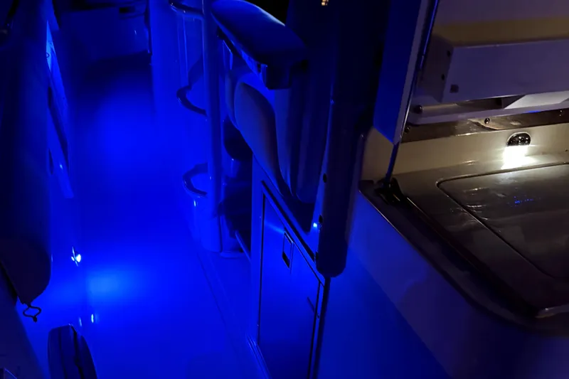 Slide: The Image of Interior of 2014 Boston Whaler 350 Outrage with blue LED lighting. - 66