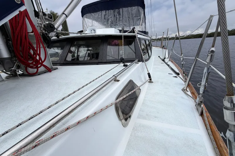Slide: The Image of Custom Build 50' Ketch, 2011, Earl Retmaster, Bruce Roberts 434 Pilothouse, docked on calm water. - 10