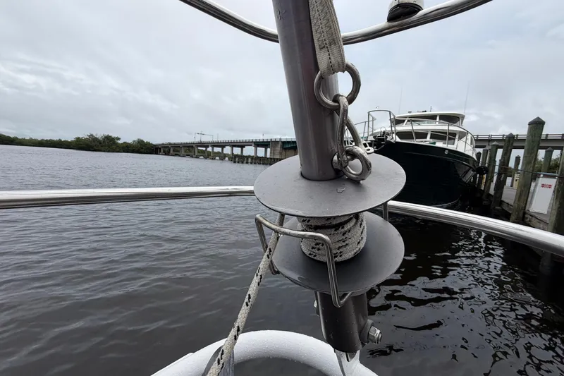 Slide: The Image of Custom Build 50' Ketch, Earl Retmaster, docked near bridge, 2011 model. - 14
