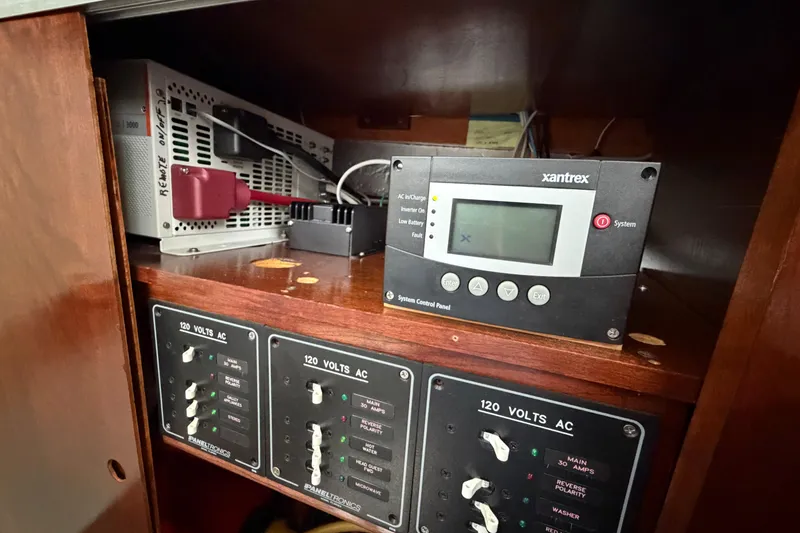 Slide: The Image of Electrical control panel in a 2011 Custom Build 50' Ketch, featuring Xantrex system. - 34