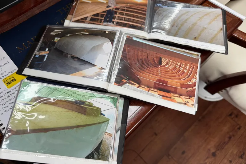 Slide: The Image of Photo album showcasing the construction of a 2011 Custom Build 50' Ketch sailboat. - 38