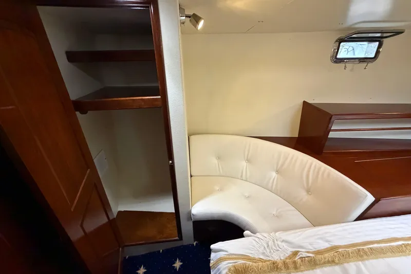 Slide: The Image of Luxurious interior of 2011 Custom Build 50' Ketch with elegant seating and wooden cabinetry. - 51