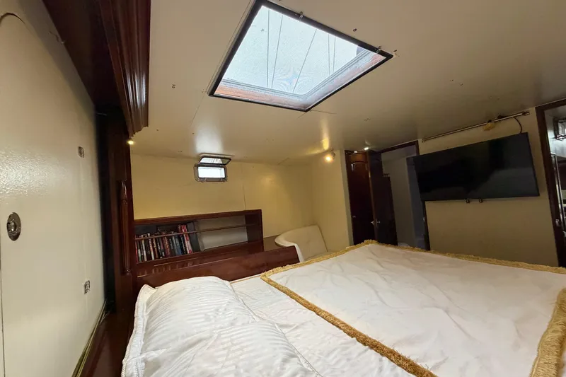 Slide: The Image of Luxurious cabin interior of 2011 Custom Build 50' Ketch with skylight and TV. - 53