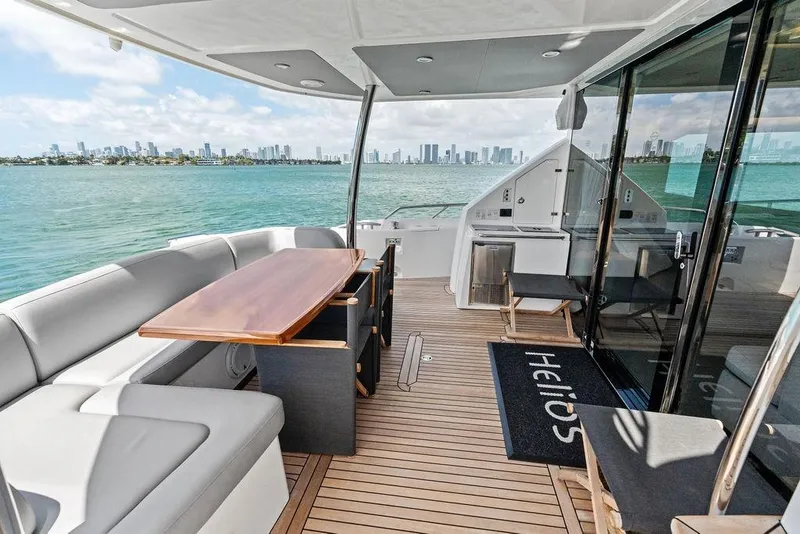 Slide: The Image of Luxurious Sunseeker 75 Sport Yacht 2018 with elegant deck and stunning waterfront view. - 21