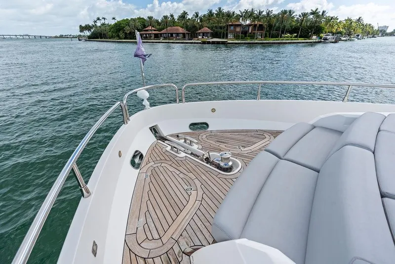 Slide: The Image of Luxurious Sunseeker 75 Sport Yacht deck with scenic waterfront view, 2018 model. - 37