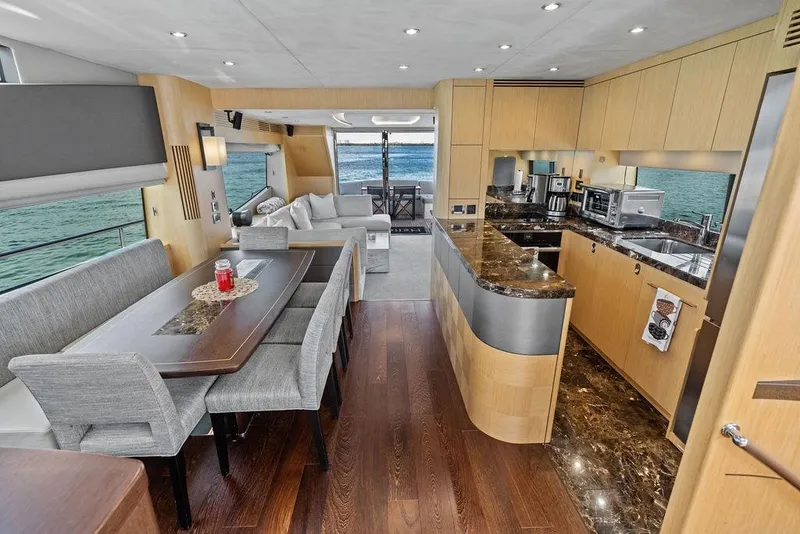 Slide: The Image of Luxurious interior of 2018 Sunseeker 75 Sport Yacht with modern kitchen and dining area. - 41