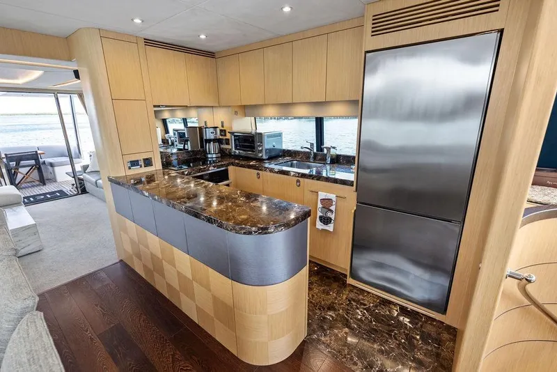Slide: The Image of Luxurious kitchen interior of 2018 Sunseeker 75 Sport Yacht with modern appliances and sleek design. - 44