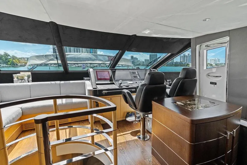 Slide: The Image of Luxurious interior of 2018 Sunseeker 75 Sport Yacht with modern helm and panoramic windows. - 46