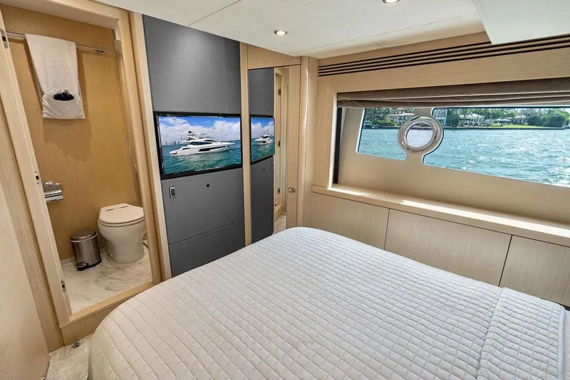 Slide: The Image of Luxurious Sunseeker 75 Sport Yacht 2018 bedroom with ensuite bathroom and scenic window view. - 51