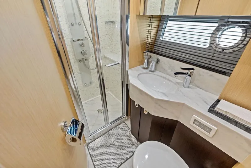 Slide: The Image of Luxurious bathroom in 2018 Sunseeker 75 Sport Yacht with modern fixtures and shower. - 56