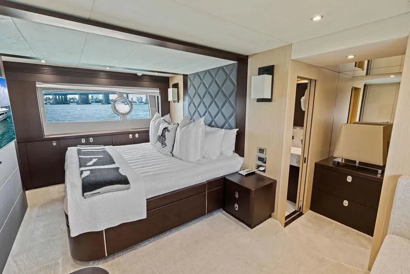 Slide: The Image of Luxurious bedroom interior of 2018 Sunseeker 75 Sport Yacht with elegant furnishings and ocean view. - 58