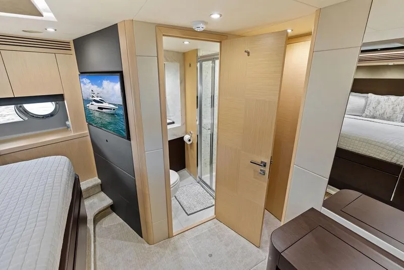Slide: The Image of Luxurious interior of 2018 Sunseeker 75 Sport Yacht with modern bedroom and ensuite bathroom. - 66