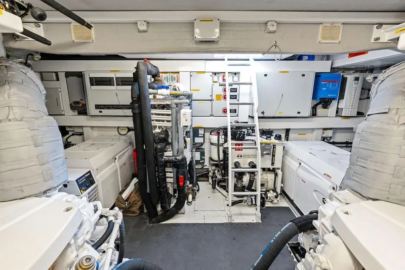 Slide: The Image of Engine room of 2018 Sunseeker 75 Sport Yacht, featuring advanced machinery and equipment. - 73