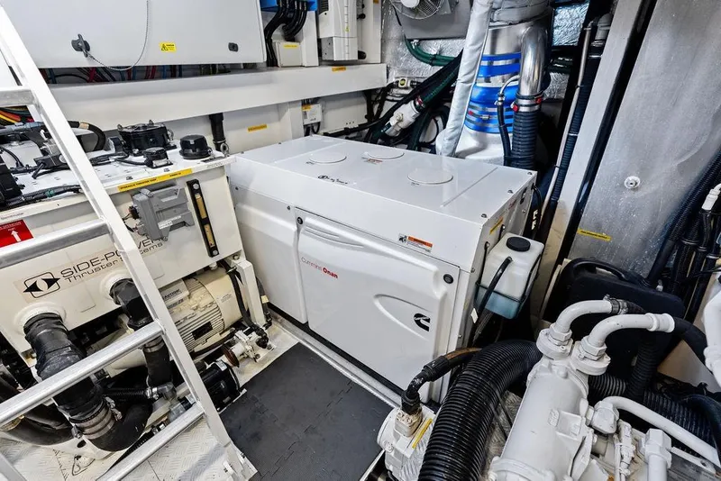 Slide: The Image of Engine room of 2018 Sunseeker 75 Sport Yacht with Cummins Onan generator and Side-Power thruster systems. - 74