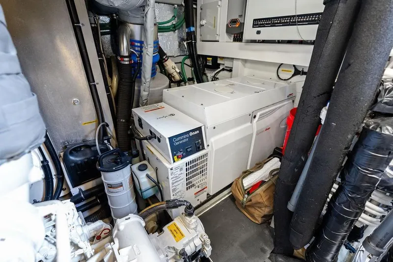 Slide: The Image of Engine room of 2018 Sunseeker 75 Sport Yacht with Cummins Onan generator. - 75