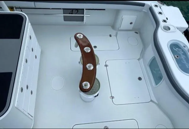 Slide: The Image of 2019 Yellowfin Center Console boat deck with rod holders and storage compartments. - 25