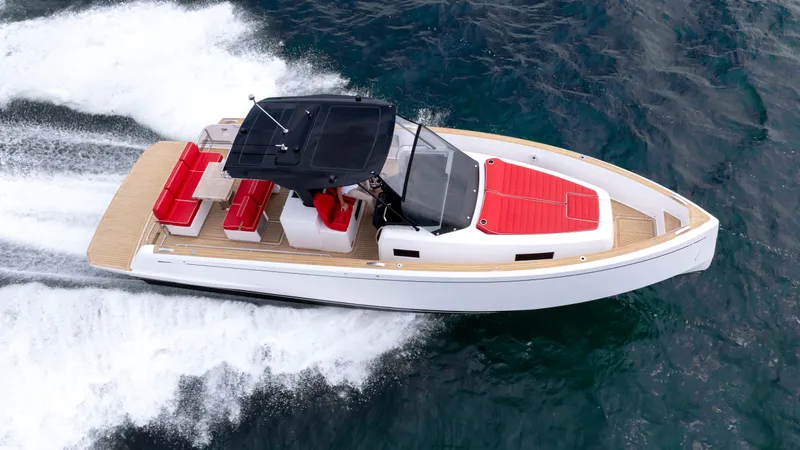 Slide: The Image of 2023 Pardo Yachts 38 cruising on water, red upholstery. - 16
