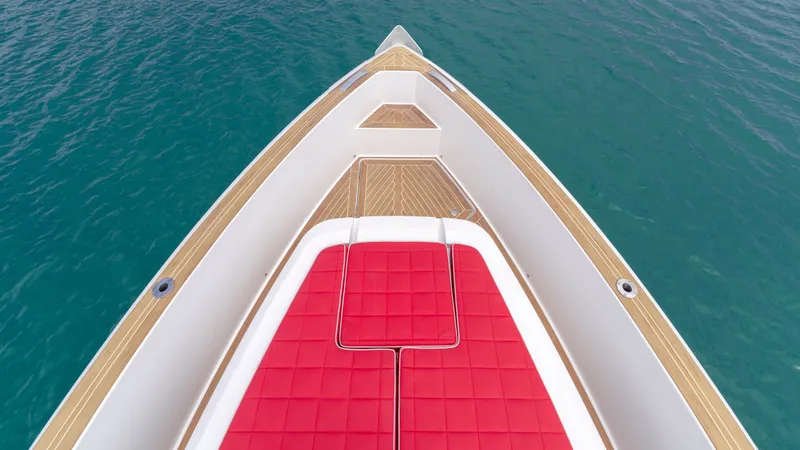Slide: The Image of 2023 Pardo Yachts 38 with red upholstery on blue water. - 37