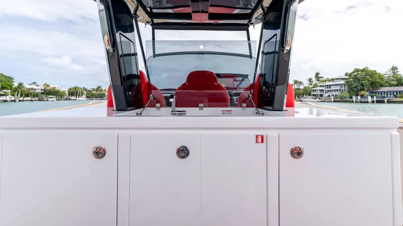 Slide: The Image of Pardo Yachts 38, 2023, featuring red interior and sleek design. - 38