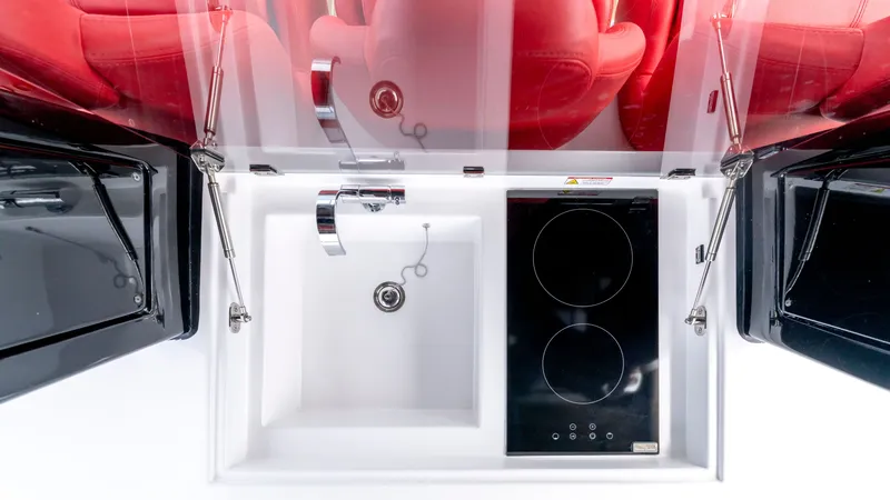 Slide: The Image of Modern yacht kitchen with sink and cooktop, Pardo Yachts 38, 2023. - 39