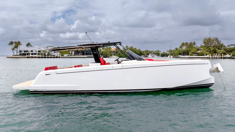 Slide: The Image of Pardo Yachts 38, 2023 model, anchored on calm waters. - 9