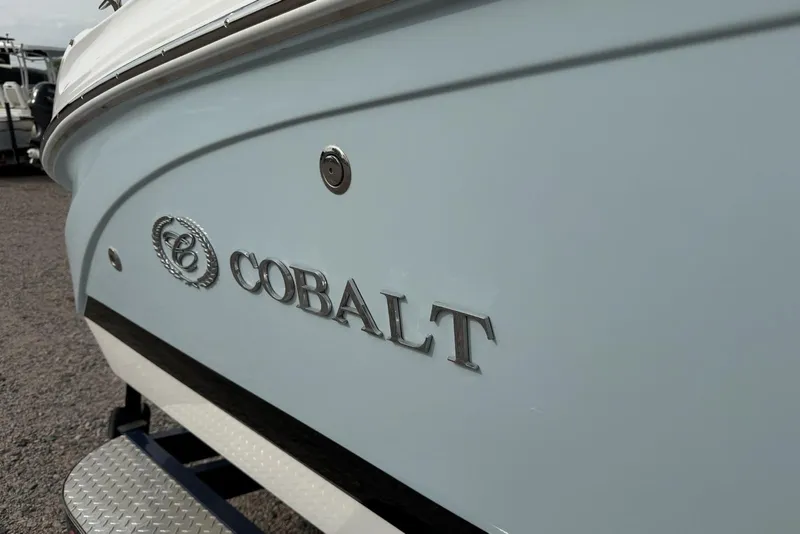 Slide: The Image of 2016 Cobalt 220 boat side view with logo and emblem. - 10
