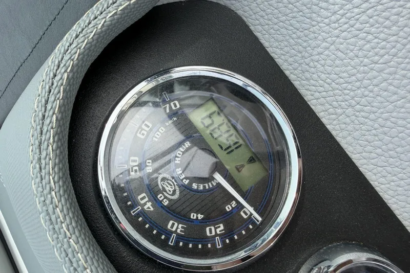 Slide: The Image of Speedometer of a 2016 Cobalt 220 boat, displaying 654.1 miles. - 19