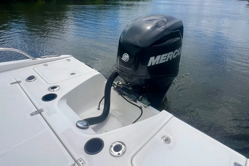Slide: The Image of Boston Whaler 2008 Dauntless boat with Mercury outboard motor on calm water. - 13