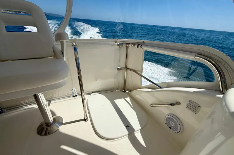 Slide: The Image of Interior view of 2003 Riviera 40 Flybridge yacht cruising on open sea. - 72