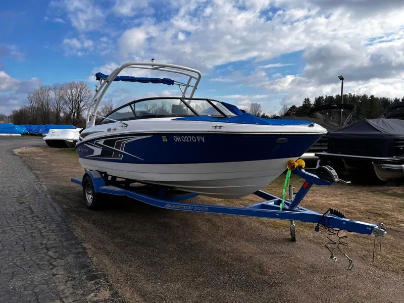 Slide: The Image of 2018 Monterey M20 20 boat on trailer, blue sky. - 9