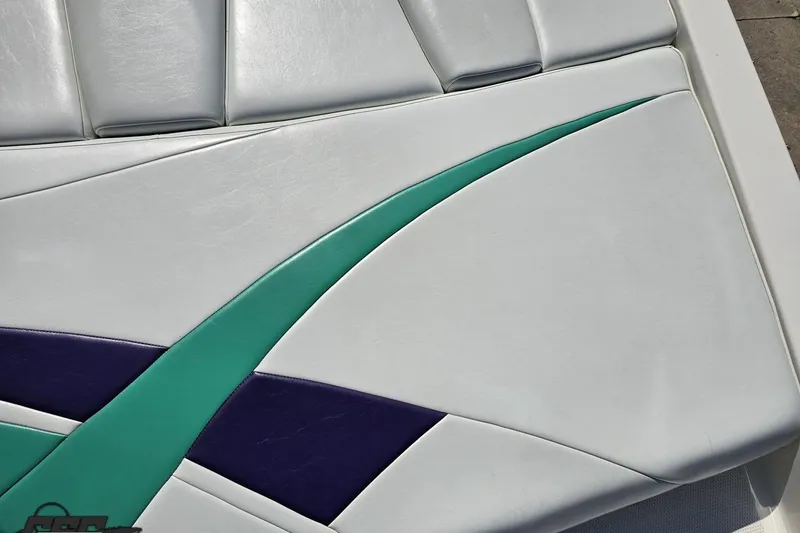 Slide: The Image of White and teal upholstery on 2001 Powerquest 280 Silencer boat seat. - 35